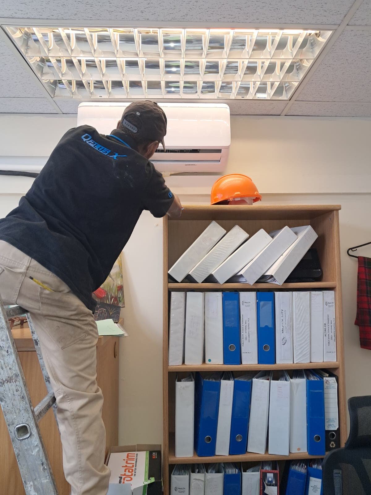 Wall unit servicing in an office